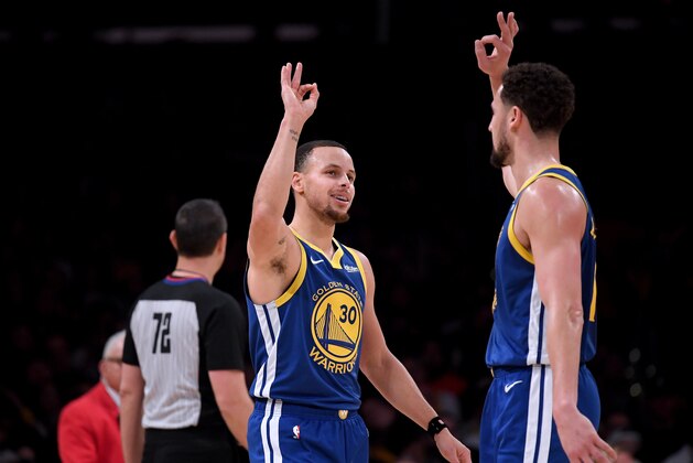 LOS ANGELES, CALIFORNIA - JANUARY 21:  Stephen Curry #30 of the Golden State Warriors celebrates with Klay Thompson #11 during a 130-111 win over the Los Angeles Lakers at Staples Center on January 21, 2019 in Los Angeles, California.  NOTE TO USER: User expressly acknowledges and agrees that, by downloading and or using this photograph, User is consenting to the terms and conditions of the Getty Images License Agreement. (Photo by Harry How/Getty Images)