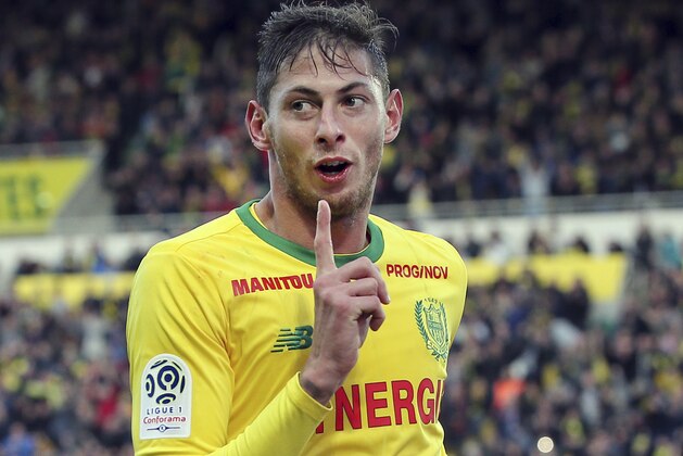 In this his picture taken on Nov. 4, 2018, Argentine soccer player, Emiliano Sala, of the FC Nantes club, western France, reacts after scoring during a soccer match against Guingam, in Nantes, France. The French civil aviation authority says Emiliano Sala was aboard a small passenger plane that went missing off the coast of the island of Guernsey. (AP Photo/David Vincent)