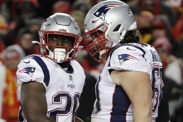 New England Patriots running back Sony Michel (26) celebrates a touchdown with center David Andrews (60) during the first half of the AFC Championship NFL football game, Sunday, Jan. 20, 2019, in Kansas City, Mo. (AP Photo/Elise Amendola)