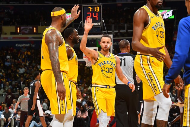 WASHINGTON, DC -  JANUARY 24: Demarcus Cousins #0 and Stephen Curry #30 of the Golden State Warriors hi-five  on January 24, 2019 at Capital One Arena in Washington, DC. NOTE TO USER: User expressly acknowledges and agrees that, by downloading and or using this Photograph, user is consenting to the terms and conditions of the Getty Images License Agreement. Mandatory Copyright Notice: Copyright 2019 NBAE (Photo by Jesse D. GarrabrantNBAE via Getty Images)