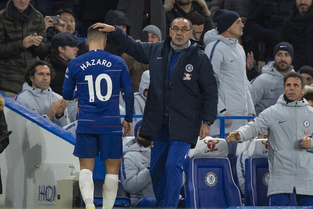 LONDON, ENGLAND - DECEMBER 08: Chelsea Manager Maurizio Sarri gives Eden Hazard a pat on the head after being substituted during the Premier League match between Chelsea FC and Manchester City at Stamford Bridge on December 8, 2018 in London, United Kingdom. (Photo by Visionhaus/Getty Images)