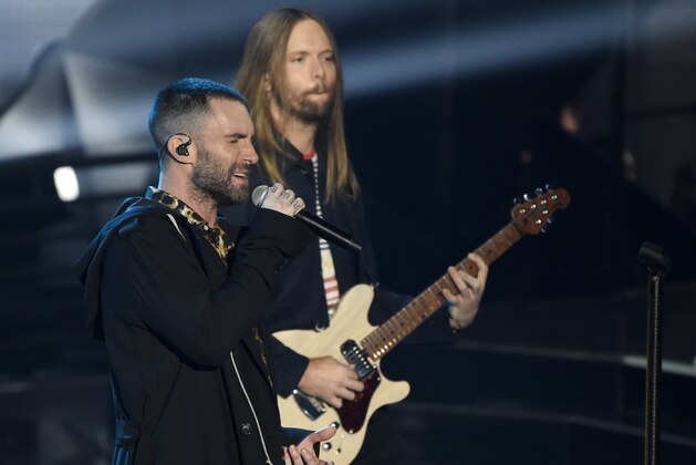 Adam Levine, left, and James Valentine of Maroon 5 perform during the 2018 iHeartRadio Music Awards at The Forum on Sunday, March 11, 2018, in Inglewood, Calif. (Photo by Chris Pizzello/Invision/AP)