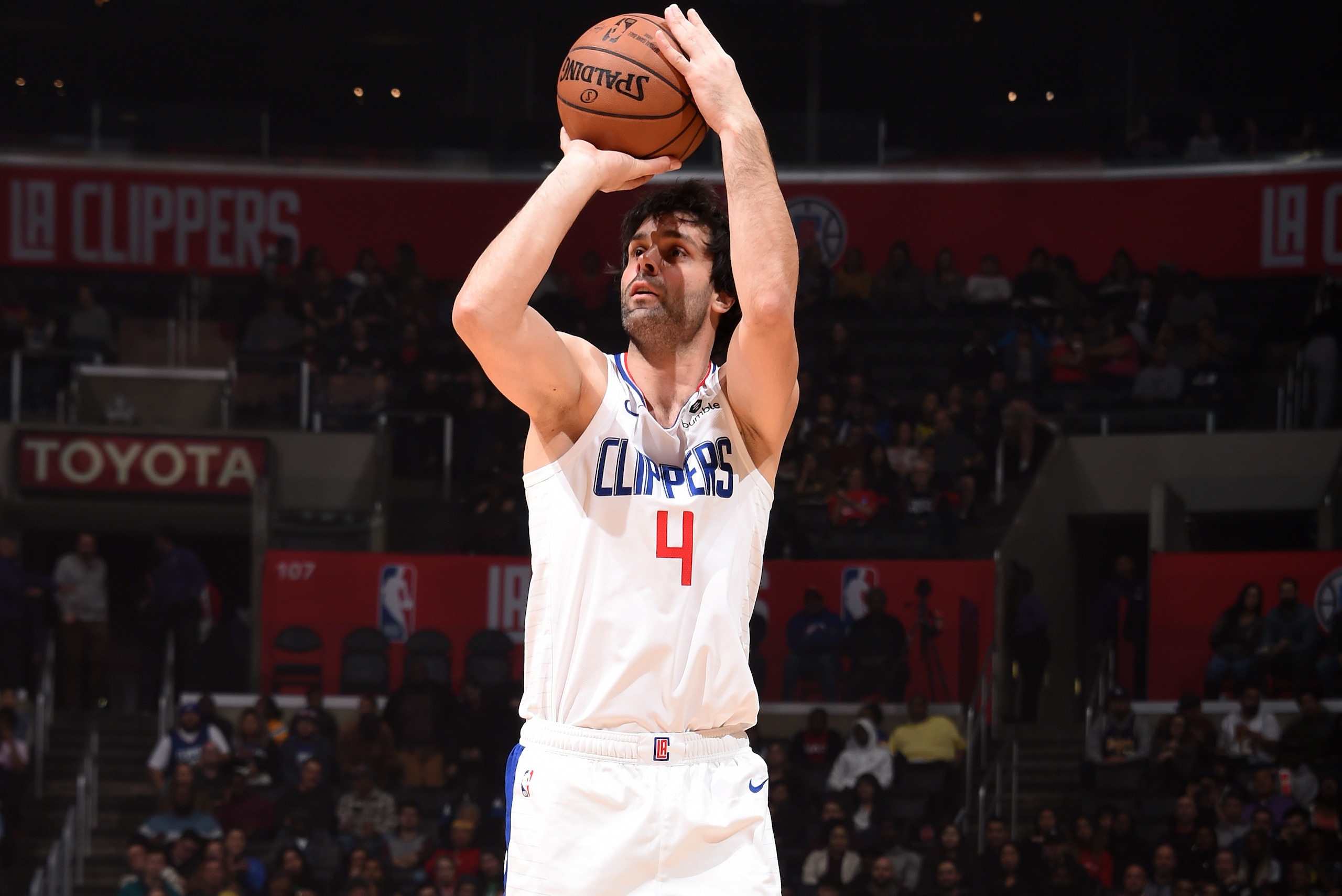 LOS ANGELES, CA - DECEMBER 11: Milos Teodosic #4 of the LA Clippers shoots the ball against the Toronto Raptors on December 11, 2018 at STAPLES Center in Los Angeles, California. NOTE TO USER: User expressly acknowledges and agrees that, by downloading and/or using this Photograph, user is consenting to the terms and conditions of the Getty Images License Agreement. Mandatory Copyright Notice: Copyright 2018 NBAE (Photo by Adam Pantozzi/NBAE via Getty Images)