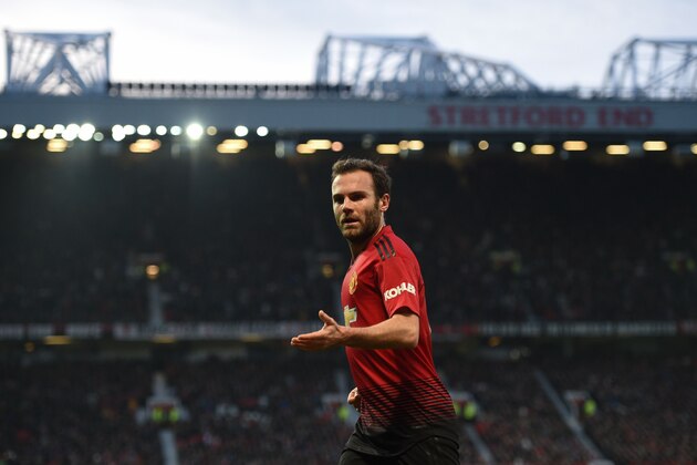 Manchester United's Spanish midfielder Juan Mata plays during the English Premier League football match between Manchester United and Huddersfield Town at Old Trafford in Manchester, north west England, on December 26, 2018. (Photo by Oli SCARFF / AFP) / RESTRICTED TO EDITORIAL USE. No use with unauthorized audio, video, data, fixture lists, club/league logos or 'live' services. Online in-match use limited to 120 images. An additional 40 images may be used in extra time. No video emulation. Social media in-match use limited to 120 images. An additional 40 images may be used in extra time. No use in betting publications, games or single club/league/player publications. /         (Photo credit should read OLI SCARFF/AFP/Getty Images)
