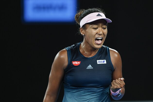 MELBOURNE, AUSTRALIA - JANUARY 24: Naomi Osaka of Japan reacts in her Women's Semi Final match against Karolina Pliskova of Czech Republic during day 11 of the 2019 Australian Open at Melbourne Park on January 24, 2019 in Melbourne, Australia. (Photo by Fred Lee/Getty Images)