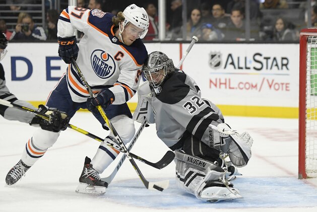 Edmonton Oilers center Connor McDavid, left, tries to score on Los Angeles Kings goaltender Jonathan Quick during the third period of an NHL hockey game, Saturday, Jan. 5, 2019, in Los Angeles. The Kings won 4-0. (AP Photo/Mark J. Terrill)