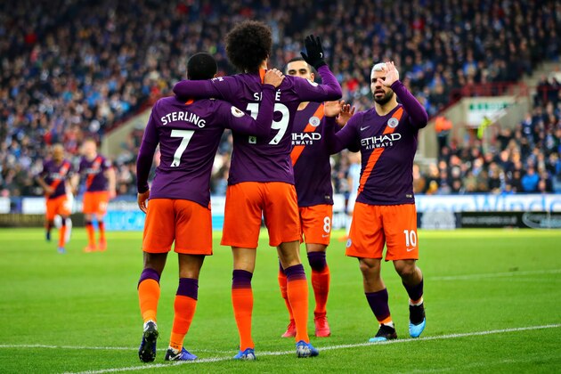 HUDDERSFIELD, ENGLAND - JANUARY 20: Leroy Sane of Manchester City celebrates scoring his sides third goal with his team during the Premier League match between Huddersfield Town and Manchester City at John Smith's Stadium on January 20, 2019 in Huddersfield, United Kingdom. (Photo by Chris Brunskill/Fantasista/Getty Images) HUDDERSFIELD, ENGLAND - JANUARY 20: Leroy Sane of Manchester City celebrates scoring his sides third goal with his team during the Premier League match between Huddersfield Town and Manchester City at John Smith's Stadium on January 20, 2019 in Huddersfield, United Kingdom. (Photo by Chris Brunskill/Fantasista/Getty Images)