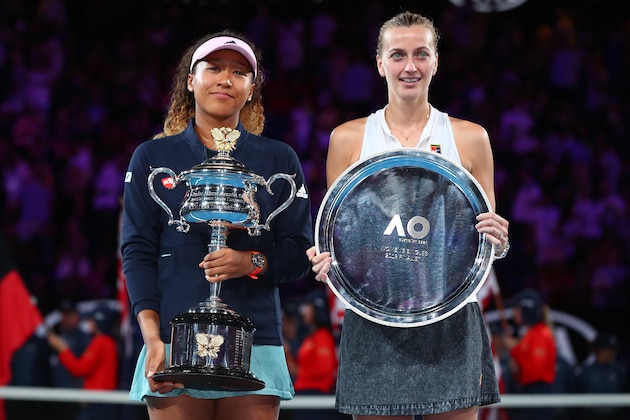 MELBOURNE, AUSTRALIA - JANUARY 26:  Naomi Osaka of Japan (L) poses with the Daphne Akhurst Memorial Cup following Petra Kvitova of the Czech Republic with the runners-up trophy following the Women's Singles Final during day 13 of the 2019 Australian Open at Melbourne Park on January 26, 2019 in Melbourne, Australia.  (Photo by Michael Dodge/Getty Images)