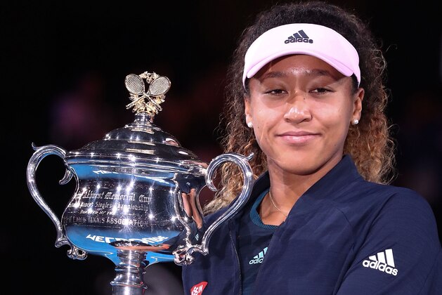 MELBOURNE, AUSTRALIA - JANUARY 26:  Naomi Osaka of Japan poses for a photo with the Daphne Akhurst Memorial Cup following victory in her Women's Singles Final match against Petra Kvitova of the Czech Republic during day 13 of the 2019 Australian Open at Melbourne Park on January 26, 2019 in Melbourne, Australia.   (Photo by Scott Barbour/Getty Images)