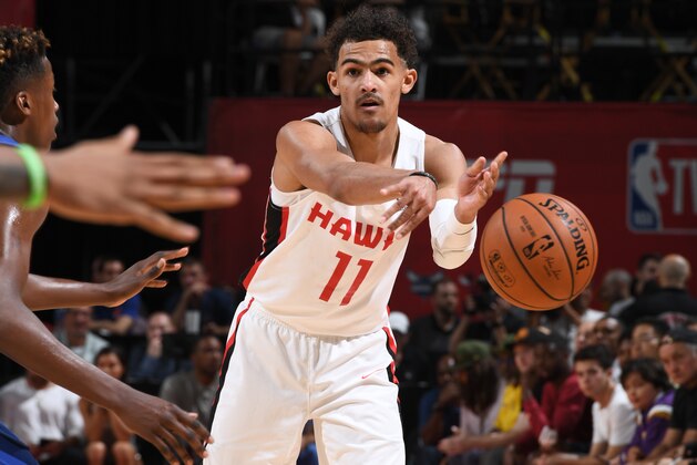 LAS VEGAS, NV - JULY 7: Trae Young #11 of the Atlanta Hawks passes the ball against the New York Knicks during the 2018 Las Vegas Summer League on July 7, 2018 at the Thomas & Mack Center in Las Vegas, Nevada. NOTE TO USER: User expressly acknowledges and agrees that, by downloading and/or using this Photograph, user is consenting to the terms and conditions of the Getty Images License Agreement. Mandatory Copyright Notice: Copyright 2018 NBAE (Photo by Garrett Ellwood/NBAE via Getty Images) LAS VEGAS, NV - JULY 7: Trae Young #11 of the Atlanta Hawks passes the ball against the New York Knicks during the 2018 Las Vegas Summer League on July 7, 2018 at the Thomas & Mack Center in Las Vegas, Nevada. NOTE TO USER: User expressly acknowledges and agrees that, by downloading and/or using this Photograph, user is consenting to the terms and conditions of the Getty Images License Agreement. Mandatory Copyright Notice: Copyright 2018 NBAE (Photo by Garrett Ellwood/NBAE via Getty Images)