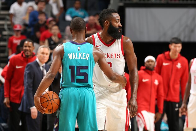 CHARLOTTE, NC - OCTOBER 27: Kemba Walker #15 of the Charlotte Hornets and James Harden #13 of the Houston Rockets hug after the game on October 27, 2017 at Spectrum Center in Charlotte, North Carolina. NOTE TO USER: User expressly acknowledges and agrees that, by downloading and or using this photograph, User is consenting to the terms and conditions of the Getty Images License Agreement.  Mandatory Copyright Notice:  Copyright 2017 NBAE (Photo by Kent Smith/NBAE via Getty Images)