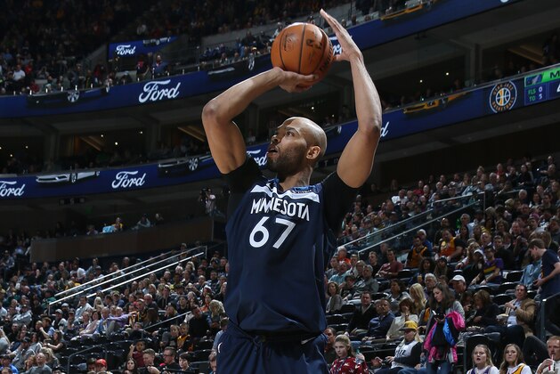 SALT LAKE CITY, UT -  JANUARY 25: Taj Gibson #67 of the Minnesota Timberwolves shoots a three-pointer during the game during the game against the Utah Jazz on January 25, 2019 at Vivint Smart Home Arena in Salt Lake City, Utah. NOTE TO USER: User expressly acknowledges and agrees that, by downloading and or using this Photograph, User is consenting to the terms and conditions of the Getty Images License Agreement. Mandatory Copyright Notice: Copyright 2019 NBAE (Photo by Melissa Majchrzak/NBAE via Getty Images)