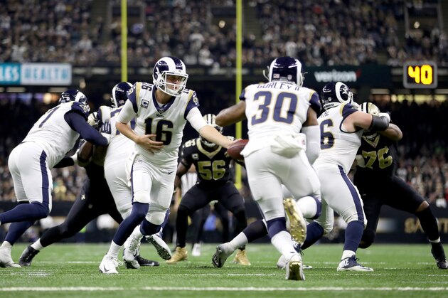NEW ORLEANS, LOUISIANA - JANUARY 20: Jared Goff #16 of the Los Angeles Rams hands the ball off to Todd Gurley #30 in the NFC Championship game at the Mercedes-Benz Superdome on January 20, 2019 in New Orleans, Louisiana. (Photo by Chris Graythen/Getty Images)