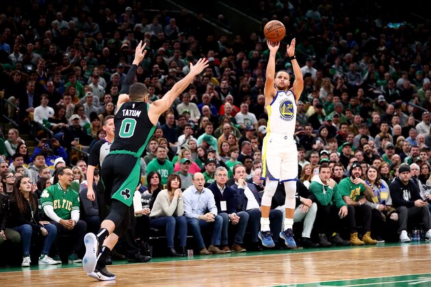 BOSTON, MA - JANUARY 26:  Stephen Curry #30 of the Golden State Warriors shoots the ball over Jayson Tatum #0 of the Boston Celtics during a game at TD Garden on January 26, 2019 in Boston, Massachusetts. NOTE TO USER: User expressly acknowledges and agrees that, by downloading and or using this photograph, User is consenting to the terms and conditions of the Getty Images License Agreement. (Photo by Adam Glanzman/Getty Images)