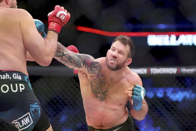 Ryan Bader, right, hits Matt Mitrione during a heavyweight mixed martial arts bout at Bellator 207, in Uncasville, CT, on Friday, October 12, 2018. Bader won via unanimous decision. (AP Photo/Gregory Payan)