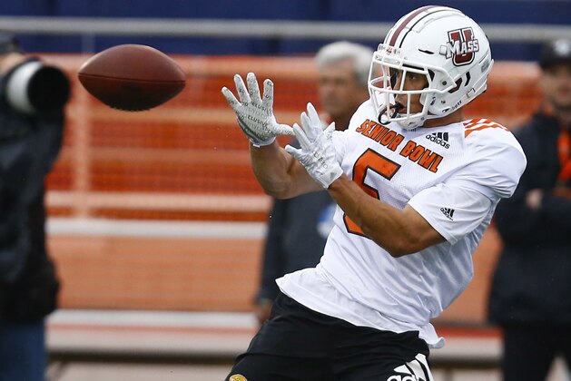 North wide receiver Andy Isabella of UMASS (5) catches a pass during practice for Saturday's Senior Bowl college football game, Tuesday, Jan. 22, 2019, in Mobile, Ala. (AP Photo/Butch Dill)