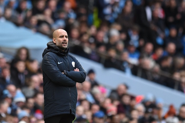 Manchester City's Spanish manager Pep Guardiola watches from the touchline during the English FA Cup fourth round football match between Manchester City and Burnley at the Etihad Stadium in Manchester, north west England, on January 26, 2019. (Photo by Oli SCARFF / AFP) / RESTRICTED TO EDITORIAL USE. No use with unauthorized audio, video, data, fixture lists, club/league logos or 'live' services. Online in-match use limited to 120 images. An additional 40 images may be used in extra time. No video emulation. Social media in-match use limited to 120 images. An additional 40 images may be used in extra time. No use in betting publications, games or single club/league/player publications. /         (Photo credit should read OLI SCARFF/AFP/Getty Images)