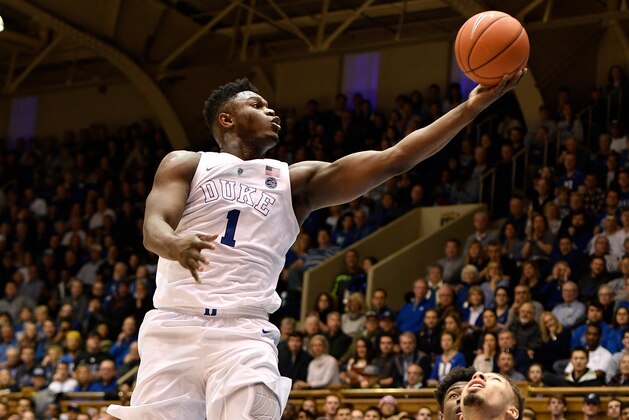 DURHAM, NC - JANUARY 26: Zion Williamson #1 of the Duke Blue Devils goes to the basket against Jose Alvarado #10 of the Georgia Tech Yellow Jackets in the first half at Cameron Indoor Stadium on January 26, 2019 in Durham, North Carolina. (Photo by Lance King/Getty Images)