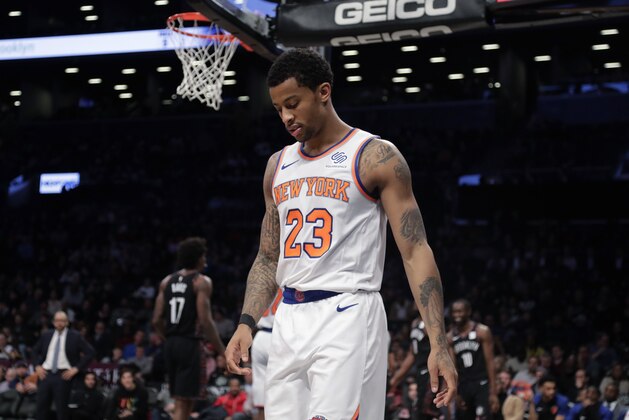 New York Knicks' Trey Burke (23) reacts during the second half of the team's NBA basketball game against the Brooklyn Nets on Friday, Jan. 25, 2019, in New York. The Nets won 109-99. (AP Photo/Frank Franklin II)