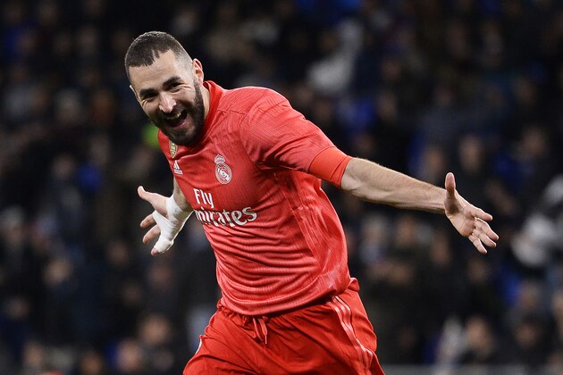 Real Madrid's French forward Karim Benzema celebrates after scoring a goal during the Spanish league football match between RCD Espanyol and Real Madrid CF at the RCDE Stadium in Cornella de Llobregat on January 27, 2019. (Photo by Josep LAGO / AFP)        (Photo credit should read JOSEP LAGO/AFP/Getty Images)