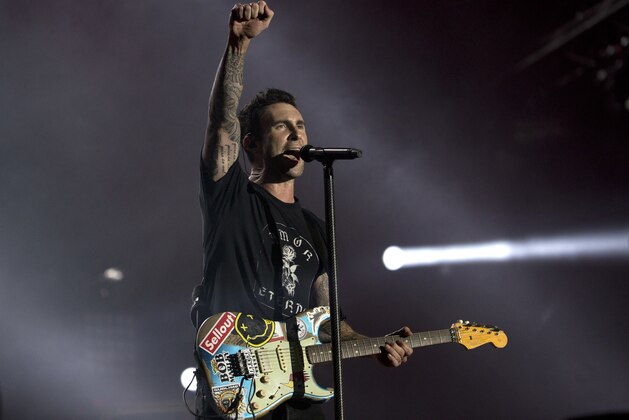 Adam Levine of Maroon 5 performs at the Rock in Rio music festival in Rio de Janeiro, Brazil, Saturday, Sept. 16, 2017. (AP Photo/Silvia Izquierdo)