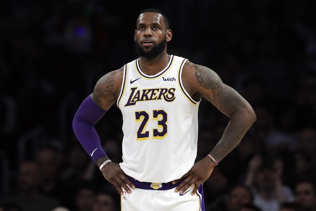 FILE - In this Dec. 23, 2018, file photo, Los Angeles Lakers' LeBron James stands during the first half of an NBA basketball game against the Memphis Grizzlies in Los Angeles. James is sorry for posting a lyric that referenced