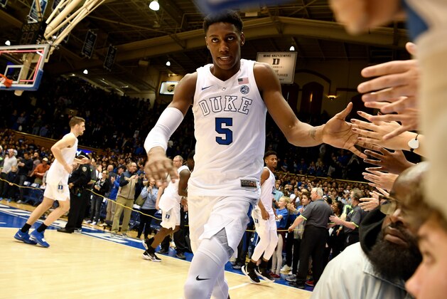DURHAM, NC - JANUARY 26: RJ Barrett #5 of the Duke Blue Devils high-fives the Cameron Crazies following their 66-53 win against the Georgia Tech Yellow Jackets at Cameron Indoor Stadium on January 26, 2019 in Durham, North Carolina. (Photo by Lance King/Getty Images)