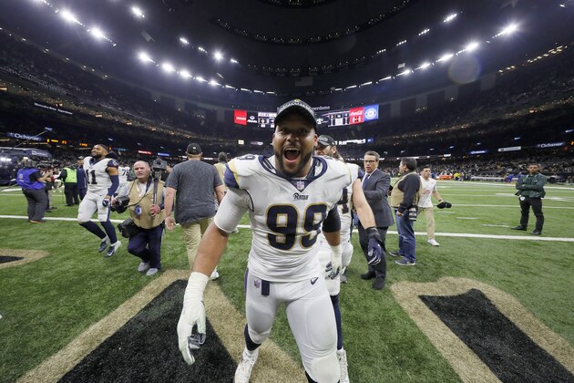NEW ORLEANS, LOUISIANA - JANUARY 20: Aaron Donald #99 of the Los Angeles Rams celebrates after defeating the New Orleans Saints in the NFC Championship game at the Mercedes-Benz Superdome on January 20, 2019 in New Orleans, Louisiana. The Los Angeles Rams defeated the New Orleans Saints with a score of 26 to 23. (Photo by Kevin C. Cox/Getty Images) NEW ORLEANS, LOUISIANA - JANUARY 20: Aaron Donald #99 of the Los Angeles Rams celebrates after defeating the New Orleans Saints in the NFC Championship game at the Mercedes-Benz Superdome on January 20, 2019 in New Orleans, Louisiana. The Los Angeles Rams defeated the New Orleans Saints with a score of 26 to 23. (Photo by Kevin C. Cox/Getty Images)