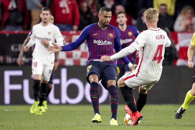 SEVILLA, SPAIN - JANUARY 23: (L-R) Kevin Prince Boateng of FC Barcelona, Simon Kjaer of Sevilla FC during the Spanish Copa del Rey  match between Sevilla v FC Barcelona at the Estadio Ramon Sanchez Pizjuan on January 23, 2019 in Sevilla Spain (Photo by David S. Bustamante/Soccrates/Getty Images)