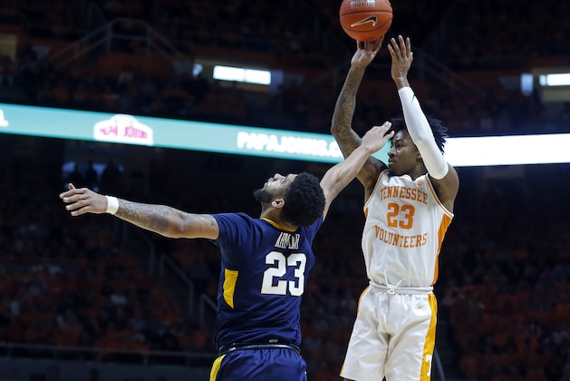 Tennessee guard Jordan Bowden (23) shoots over West Virginia forward Esa Ahmad (23) in the second half of an NCAA college basketball game Saturday, Jan. 26, 2019, in Knoxville, Tenn. Tennessee won 83-66. (AP Photo/Wade Payne)