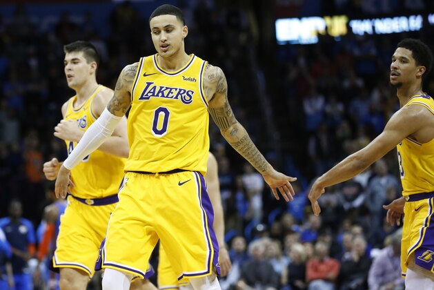 Los Angeles Lakers forward Kyle Kuzma (0) is congratulated by teammate Josh Hart during an NBA basketball game between the Los Angeles Lakers and the Oklahoma City Thunder in Oklahoma City, Thursday, Jan. 17, 2019. (AP Photo/Sue Ogrocki) Los Angeles Lakers forward Kyle Kuzma (0) is congratulated by teammate Josh Hart during an NBA basketball game between the Los Angeles Lakers and the Oklahoma City Thunder in Oklahoma City, Thursday, Jan. 17, 2019. (AP Photo/Sue Ogrocki)