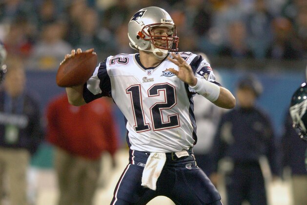 JACKSONVILLE, FL - FEBRUARY 6:  Tom Brady #12 of the New England Patriots drops back to pass against the Philadelphia Eagles during Super Bowl XXXIX at Alltel Stadium on February 6, 2005 in Jacksonville, Florida. The Patriots won the game 24-21. (Photo by Focus on Sport/Getty Images)