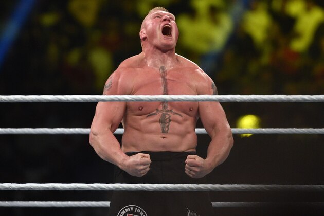 Brock Lesnar celebrates after winning the WWE Universal Championship match as part of as part of the World Wrestling Entertainment (WWE) Crown Jewel pay-per-view at the King Saud University Stadium in Riyadh on November 2, 2018. (Photo by Fayez Nureldine / AFP)        (Photo credit should read FAYEZ NURELDINE/AFP/Getty Images)