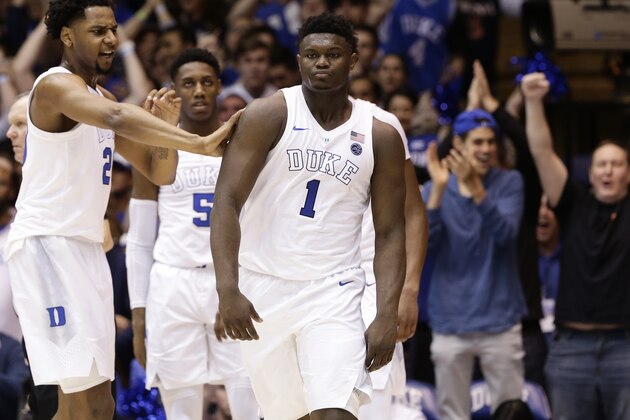 Duke's Marques Bolden, left, RJ Barrett and Zion Williamson (1) react following a basket against Virginia during the first half of an NCAA college basketball game in Durham, N.C., Saturday, Jan. 19, 2019. (AP Photo/Gerry Broome) Duke's Marques Bolden, left, RJ Barrett and Zion Williamson (1) react following a basket against Virginia during the first half of an NCAA college basketball game in Durham, N.C., Saturday, Jan. 19, 2019. (AP Photo/Gerry Broome)
