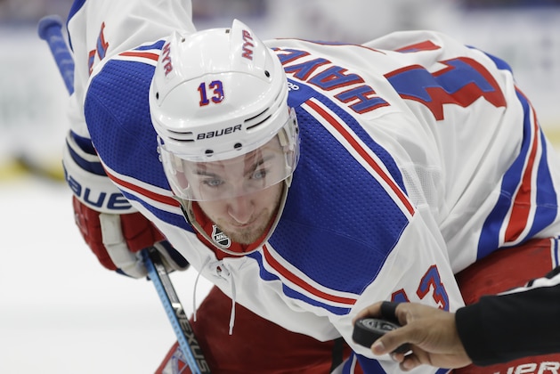 New York Rangers center Kevin Hayes (13) looks at the puck during a faceoff against the Tampa Bay Lightning during the first period of an NHL hockey game Monday, Dec. 10, 2018, in Tampa, Fla. (AP Photo/Chris O'Meara)