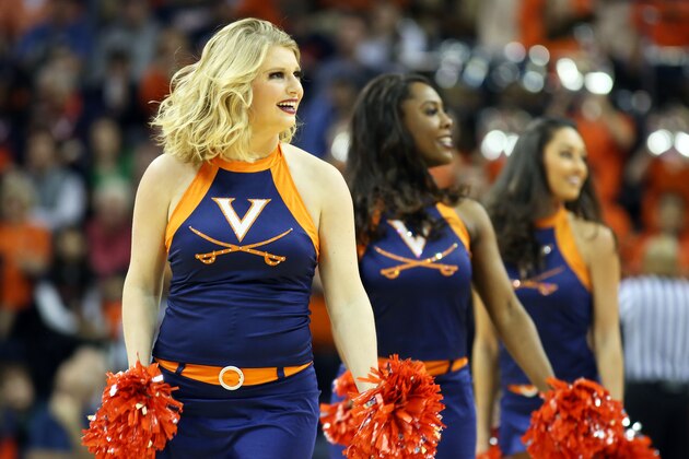 CHARLOTTESVILLE, VA - DECEMBER 22: Virginia Cavaliers cheerleaders perform in the second half during a game against the William & Mary Tribe at John Paul Jones Arena on December 22, 2018 in Charlottesville, Virginia. (Photo by Ryan M. Kelly/Getty Images)