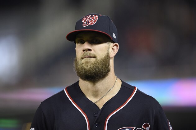Washington Nationals' Bryce Harper stands on the field during a baseball game against the New York Mets, Friday, Sept. 21, 2018, in Washington. The Mets won 4-2. (AP Photo/Nick Wass)