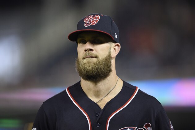 Washington Nationals' Bryce Harper stands on the field during a baseball game against the New York Mets, Friday, Sept. 21, 2018, in Washington. The Mets won 4-2. (AP Photo/Nick Wass)