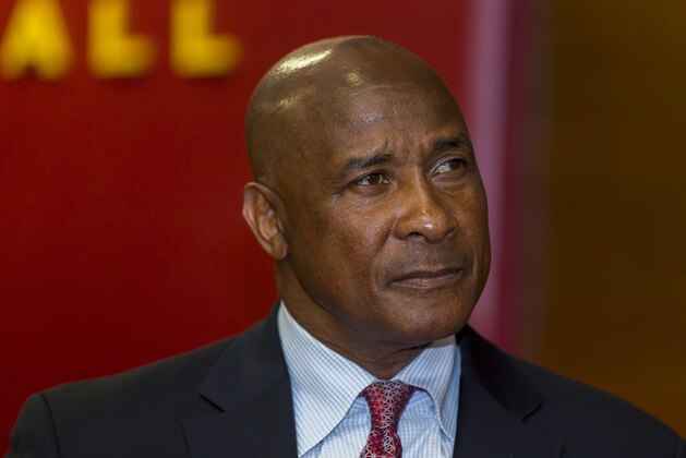 University of Southern California's new athletic director, Lynn Swann pauses during is appointment news conference at the USC campus in Los Angeles, Thursday, April 14, 2016. Although Swann has no experience in high-level collegiate athletic administration, he is the third straight former USC football player to take the post. The former wide receiver, a Pro Football Hall of Famer, will succeed Pat Haden on July 1. (AP Photo/Damian Dovarganes)