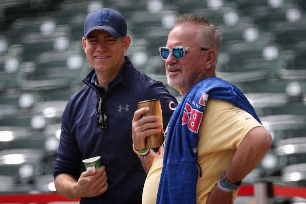 CHICAGO, IL - JUNE 20:  General manager Theo Epstein (L) and manager Joe Maddon of the Chicago Cubs meet before the game against the Los Angeles Dodgers at Wrigley Field on June 20, 2018 in Chicago, Illinois.  (Photo by Dylan Buell/Getty Images)