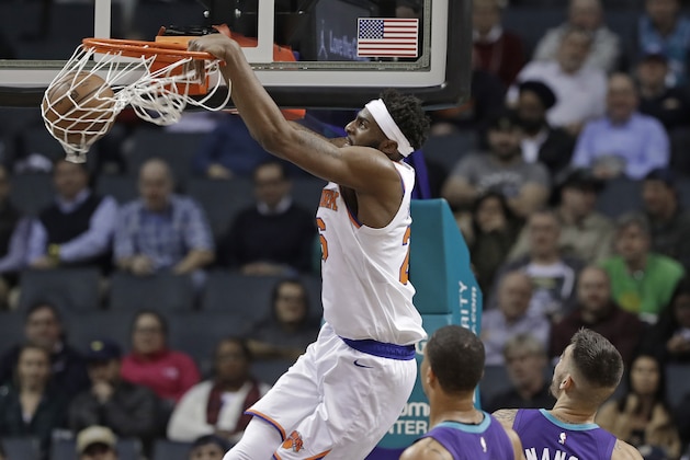 New York Knicks' Mitchell Robinson (26) dunks against the Charlotte Hornets during the first half of an NBA basketball game in Charlotte, N.C., Monday, Jan. 28, 2019. (AP Photo/Chuck Burton)