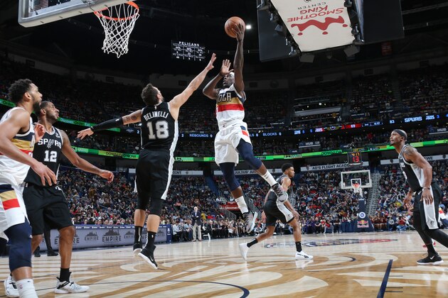 NEW ORLEANS, LA - JANUARY 26:  Jrue Holiday #11 of the New Orleans Pelicans shoots the ball against the San Antonio Spurs on January 26, 2019 at the Smoothie King Center in New Orleans, Louisiana. NOTE TO USER: User expressly acknowledges and agrees that, by downloading and or using this Photograph, user is consenting to the terms and conditions of the Getty Images License Agreement. Mandatory Copyright Notice: Copyright 2019 NBAE (Photo by Layne Murdoch Jr./NBAE via Getty Images)