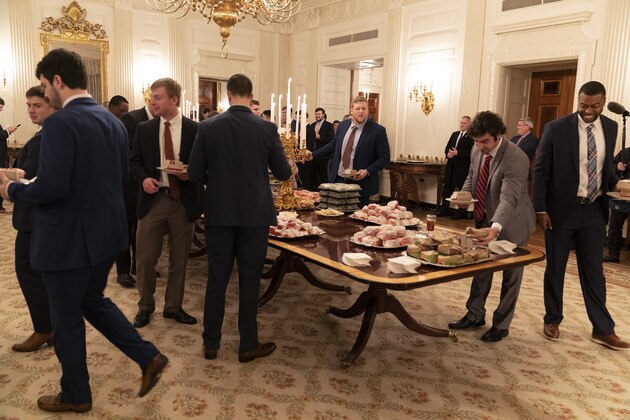 WASHINGTON, DC - JANUARY 14: (AFP OUT) Members of the Clemson Tigers football team prepare to dine on fast food served by President Trump  to celebrate their Championship at the White House on January 14, 2019 in Washington, DC. (Photo by Chris Kleponis-Pool/Getty Images)