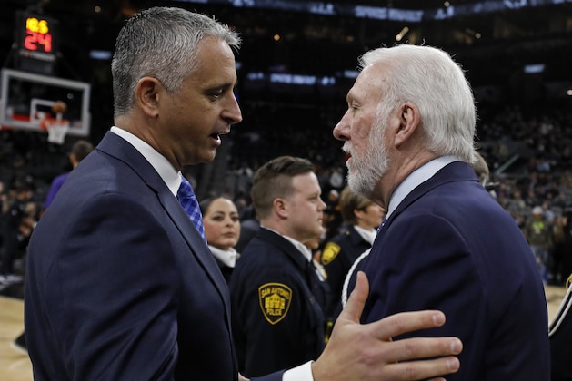 SAN ANTONIO, TX - JANUARY 29: Igor Kokoskov head coach of the Phoenix Suns talks with Gregg Popovich head coach of the San Antonio Spurs before an NBA game held January 29, 2019 at the AT&T Center in San Antonio, Texas. NOTE TO USER: User expressly acknowledges and agrees that, by downloading and or using this photograph, User is consenting to the terms and conditions of the Getty Images License Agreement.  (Photo by Edward A. Ornelas/Getty Images)