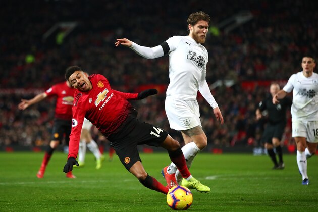 MANCHESTER, ENGLAND - JANUARY 29:  Jesse Lingard of Manchester United is challenged by Jeff Hendrick of Burnley during the Premier League match between Manchester United and Burnley at Old Trafford on January 29, 2019 in Manchester, United Kingdom.  (Photo by Clive Brunskill/Getty Images)