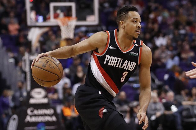 Portland Trail Blazers guard CJ McCollum (3) against the Phoenix Suns during the second half of an NBA basketball game, Thursday, Jan. 24, 2019, in Phoenix. (AP Photo/Matt York)