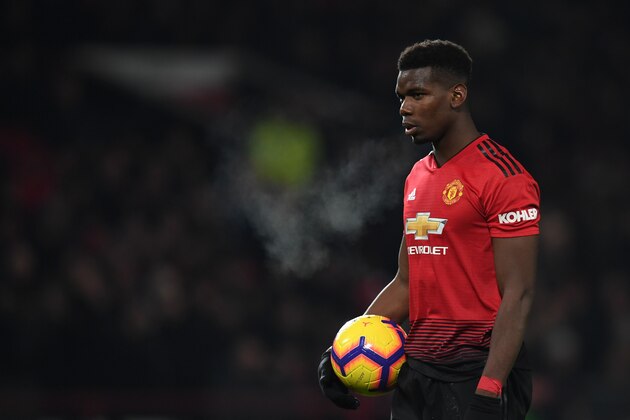 Manchester United's French midfielder Paul Pogba prepares to take a penalty during the English Premier League football match between Manchester United and Burnley at Old Trafford in Manchester, north west England, on January 29, 2019. (Photo by Paul ELLIS / AFP) / RESTRICTED TO EDITORIAL USE. No use with unauthorized audio, video, data, fixture lists, club/league logos or 'live' services. Online in-match use limited to 120 images. An additional 40 images may be used in extra time. No video emulation. Social media in-match use limited to 120 images. An additional 40 images may be used in extra time. No use in betting publications, games or single club/league/player publications. /         (Photo credit should read PAUL ELLIS/AFP/Getty Images)