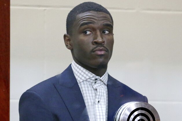 Boston Celtics guard Jabari Bird appears for his arraignment on domestic violence charges at Brighton Municipal Court, Thursday, Sept. 13, 2018 in Boston.  Prosecutors say Bird choked his girlfriend multiple times, kicked her and prevented her from leaving his apartment for hours last week before he collapsed in distress.(Angela Rowlings /The Boston Herald via AP, Pool)