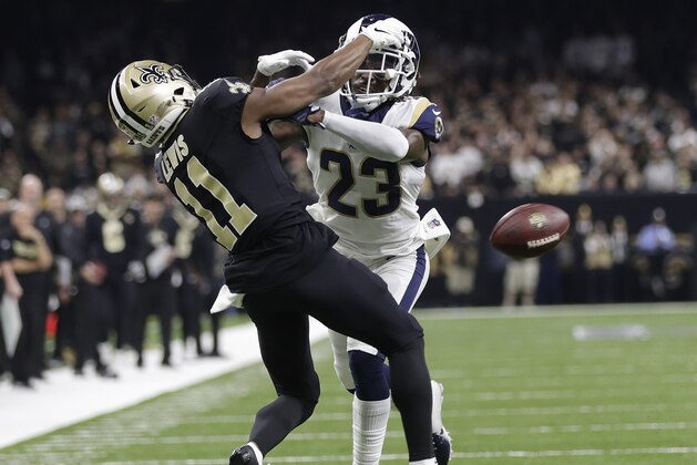 FILE - In this Jan. 20, 2019, file photo, Los Angeles Rams' Nickell Robey-Coleman breaks up a pass intended for New Orleans Saints' Tommylee Lewis during the second half of the NFL football NFC championship game, in New Orleans.  Jacksonville Jaguars defensive end Calais Campbell watched the NFL’s conference championship games on his phone while flying home from South Africa last weekend. Campbell was stunned officials chose not to penalize Robey-Coleman for flattening Saints receiver Tommylee Lewis before the ball arrived. (AP Photo/Gerald Herbert, File)