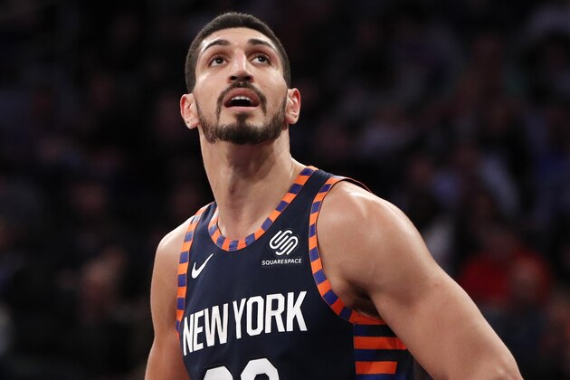 New York Knicks center Enes Kanter (00) looks at a video replay during a break in action during the second half of an NBA basketball game, Monday, Jan. 21, 2019 in New York. The Thunder defeated the Knicks 127-109. (AP Photo/Kathy Willens)